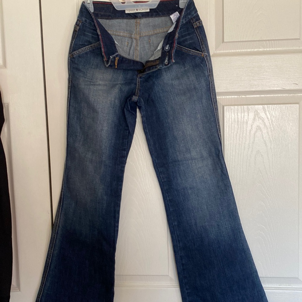 Size 2  jeans like new wide leg pattern on back pockets